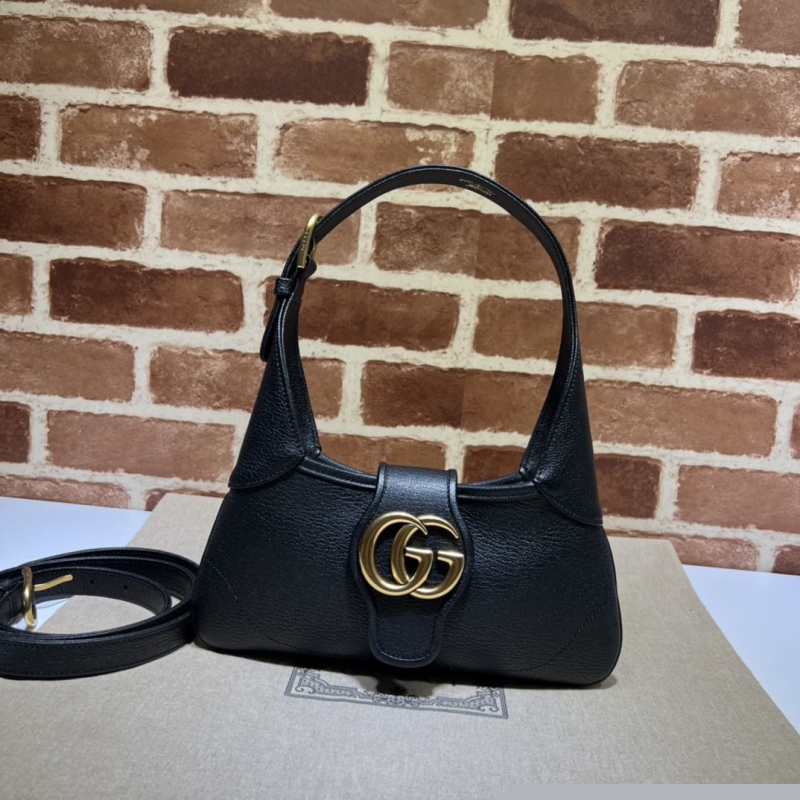 G*u*i top handle bags